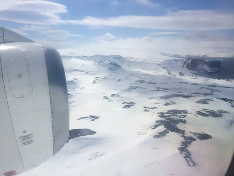 flying on a small plane to Antarctica