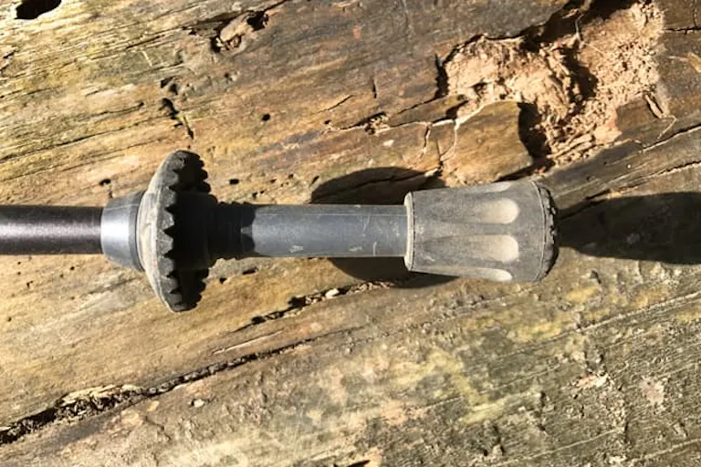 hiking trekking poles for a hiker with rubber tip protectors to save trails