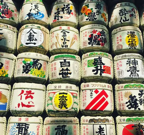 Japanese sake bottles with asian writing on them.