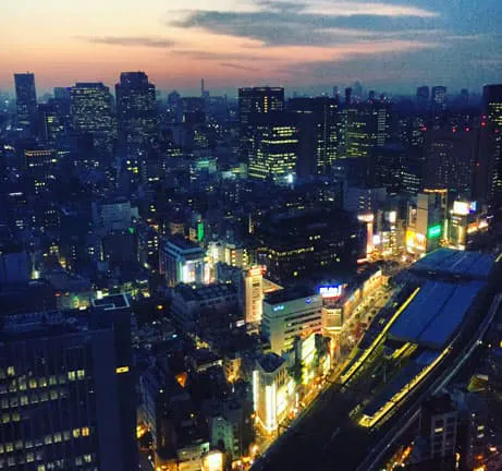 A view of a city at dusk.