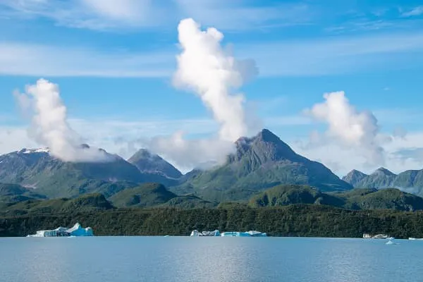 A large body of water with mountains in the background.