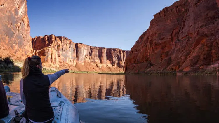 Two people on a canoe on a river in arizona.