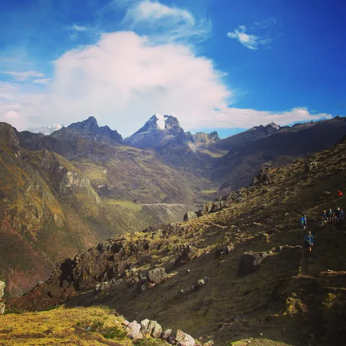 A group of people hiking in the mountains.