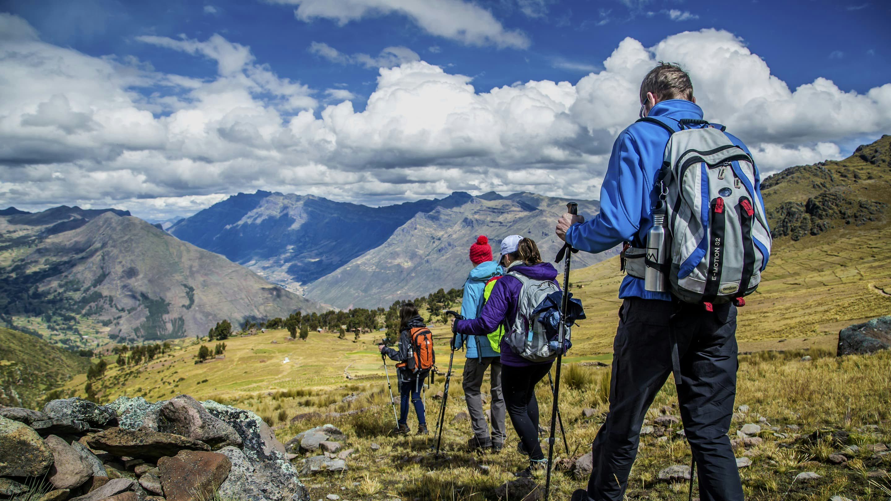 A group of people hiking in the mountains.