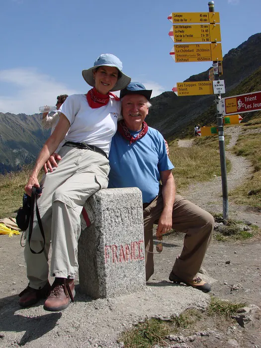 A man and woman posing for a picture.
