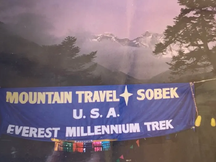 A banner that says mountain travel sobek usa everest millennium trek.