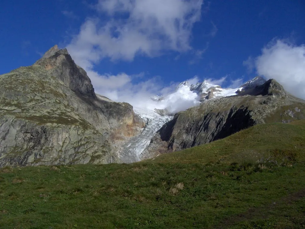 A mountain with a glacier in the background.