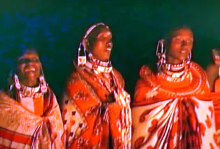A group of women dressed in traditional african attire.