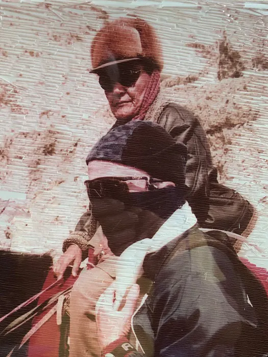 A man is riding a horse.