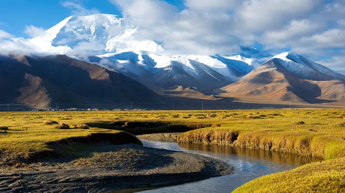 A mountain range with a river running through it.