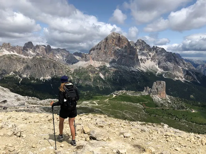 A woman hiking in the dolomites.