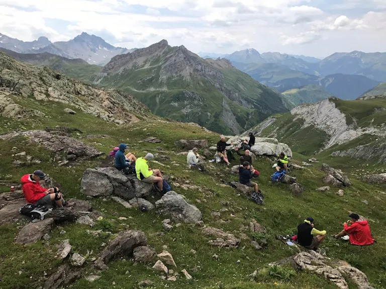 Groups resting on this MT Sobek multi-adventure hike in the Alps