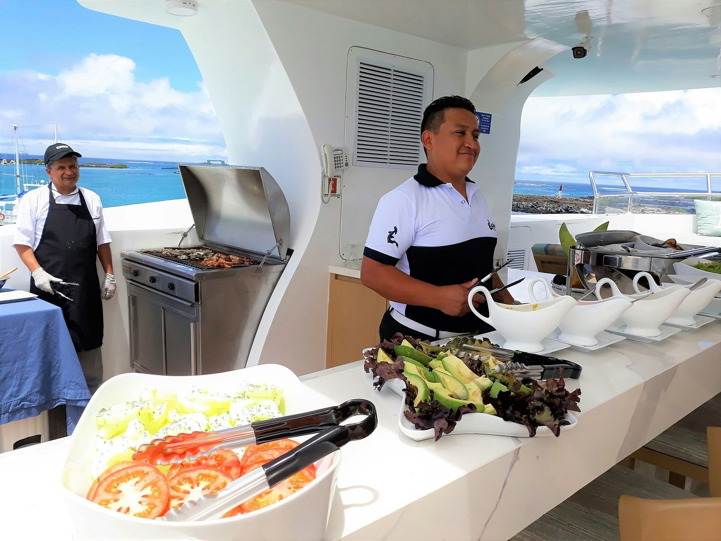 A man is preparing food on a boat.