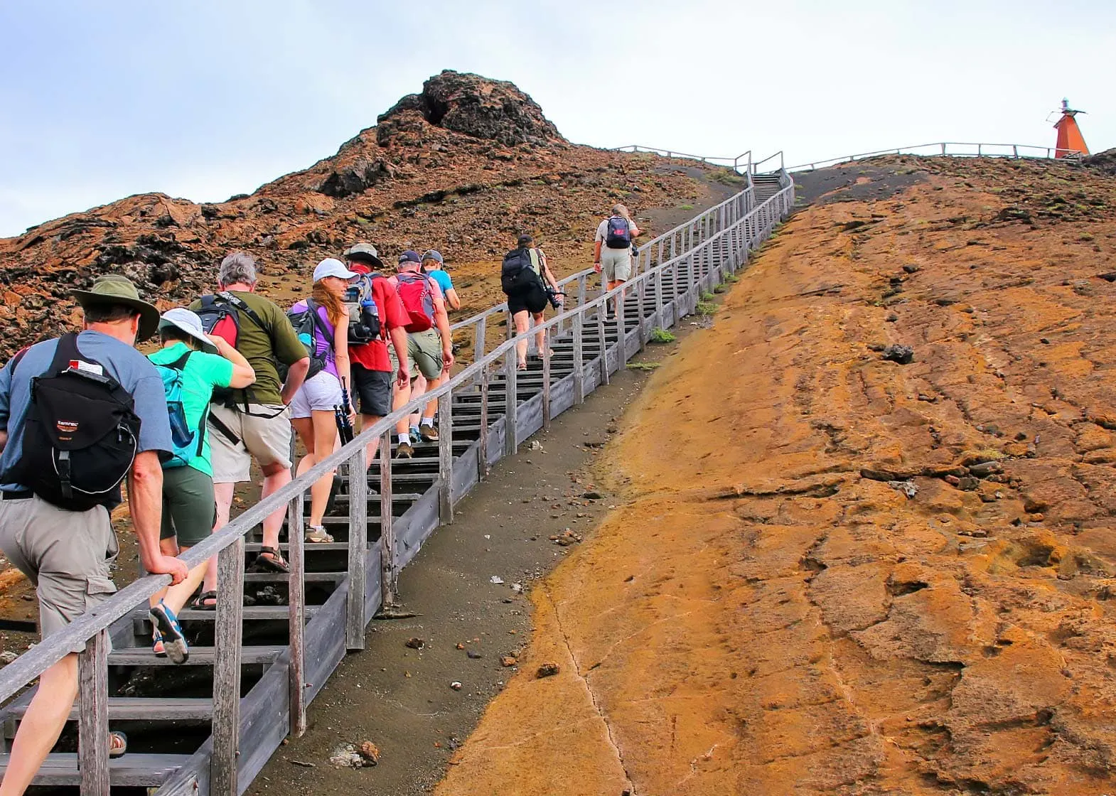 A group of people exploring a set of stairs in the Galapagos Islands.