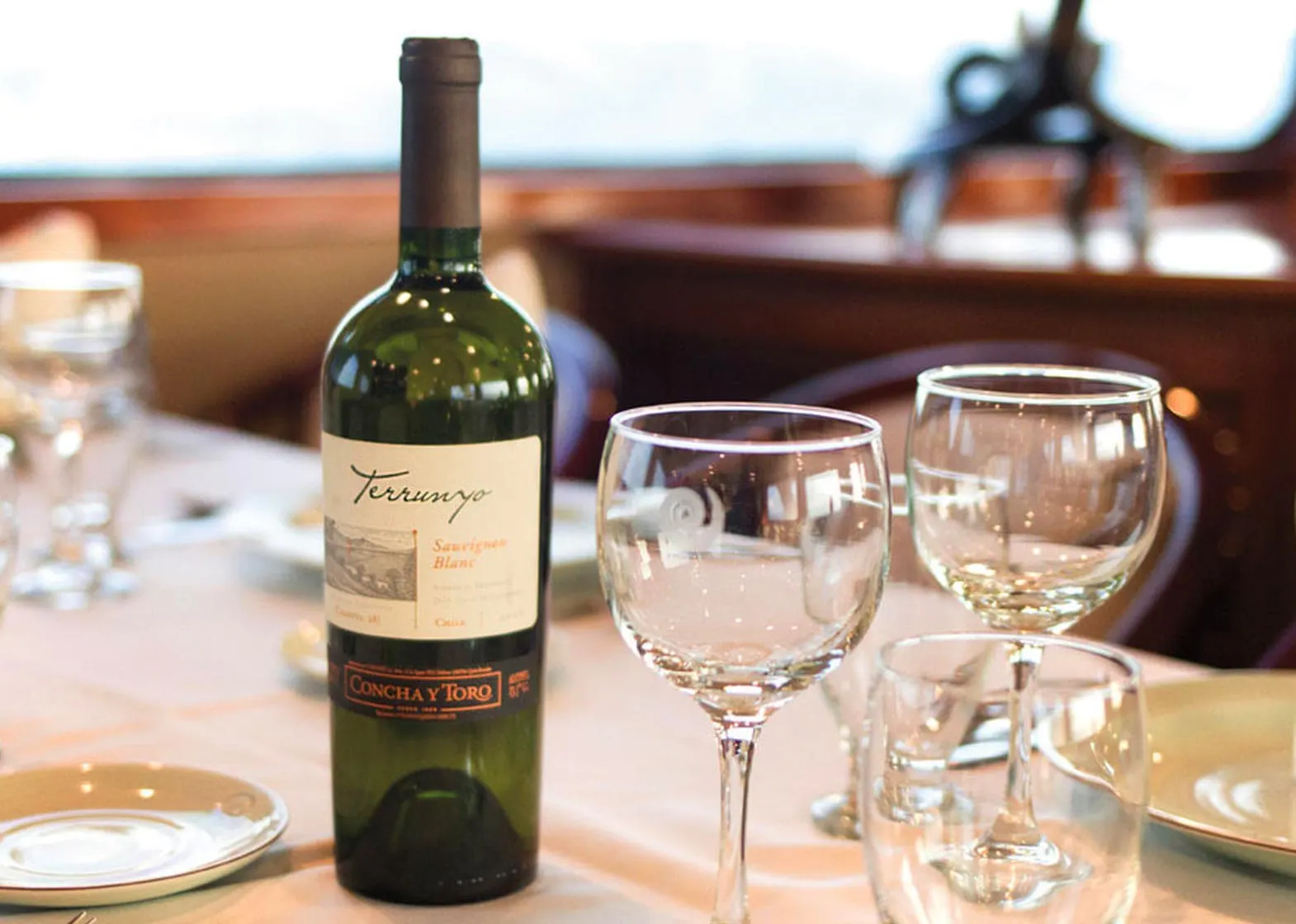 A bottle of wine on a table at Integrity Adventure Tours.