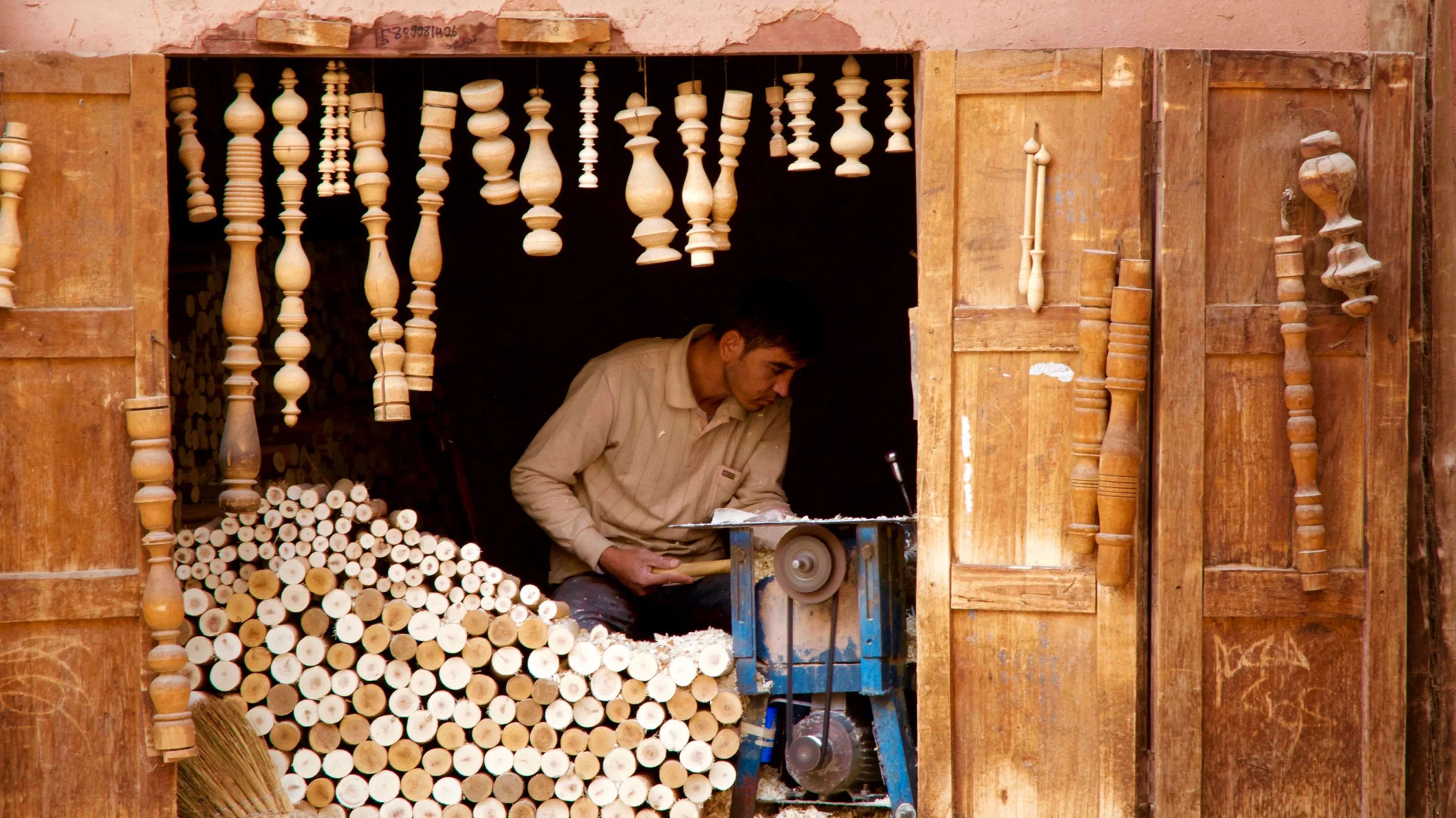 A man is working in a wooden shop.