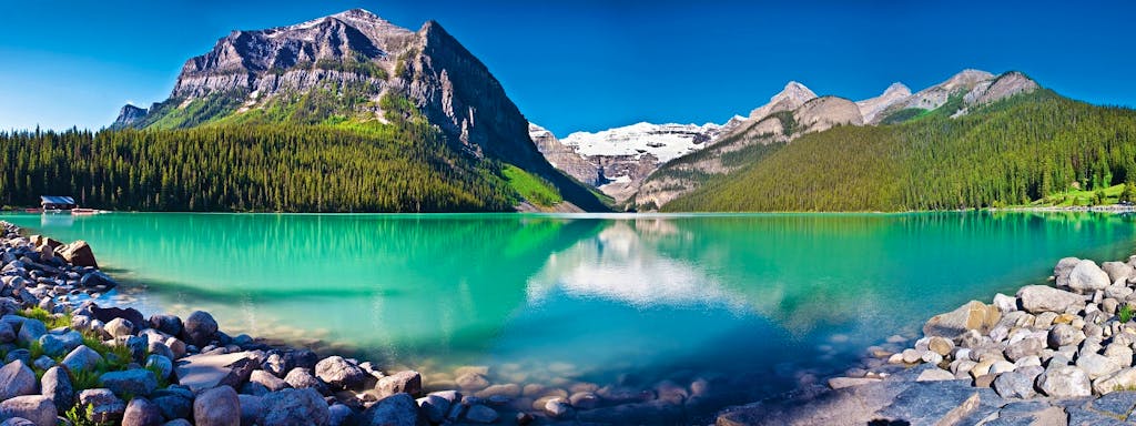 A panorama of Lake Louise on your Canada walking adventure