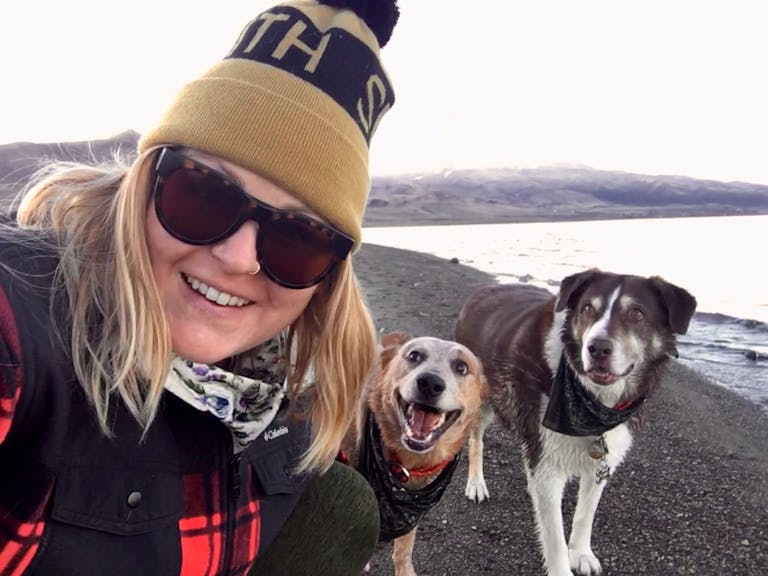 Jen a MT Sobek staff with her two dogs traveling