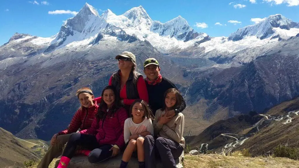 family hiking during the holiday season hiking on a family adventure with a staff from MT Sobek