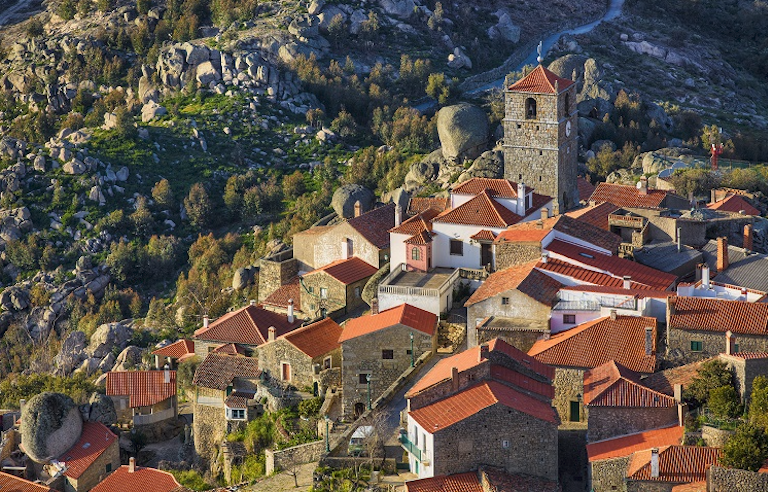 Charming historic village in Portugal nestled in a mountainside. 