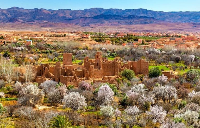 Beautiful view of Berber village in Morocco with High Atlas Mountains in the background.