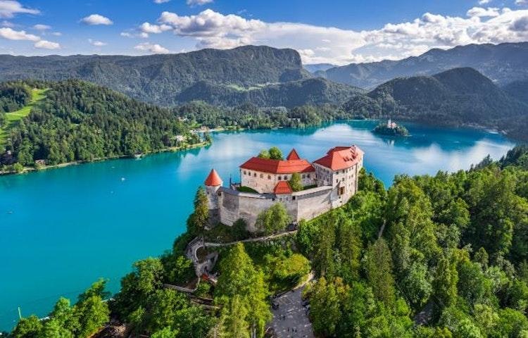 Explore the stunning castle perched on top of a lake in Bled, Slovenia – one of the best hikes for 2023!