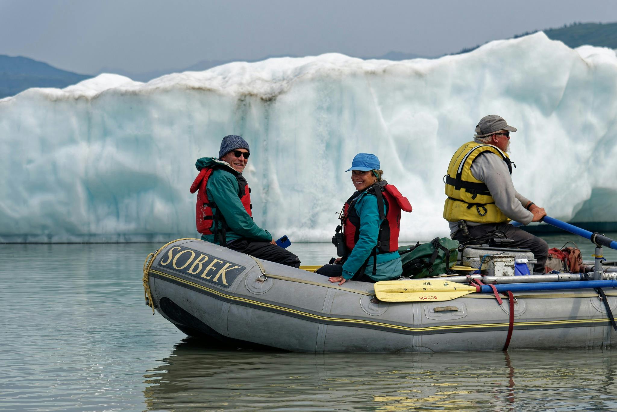 MT Sobek group  of travelers rafting the Alsek River in Alaska with a guide