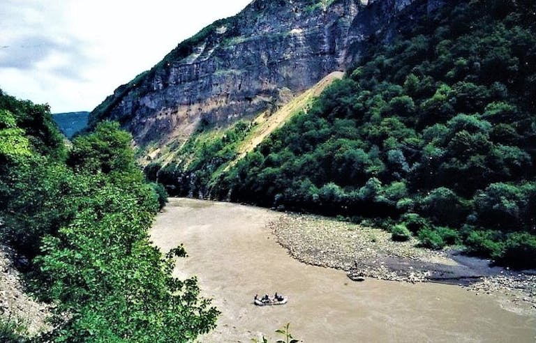 Group of people rafting down the Rioni River in the Republic of Georgia