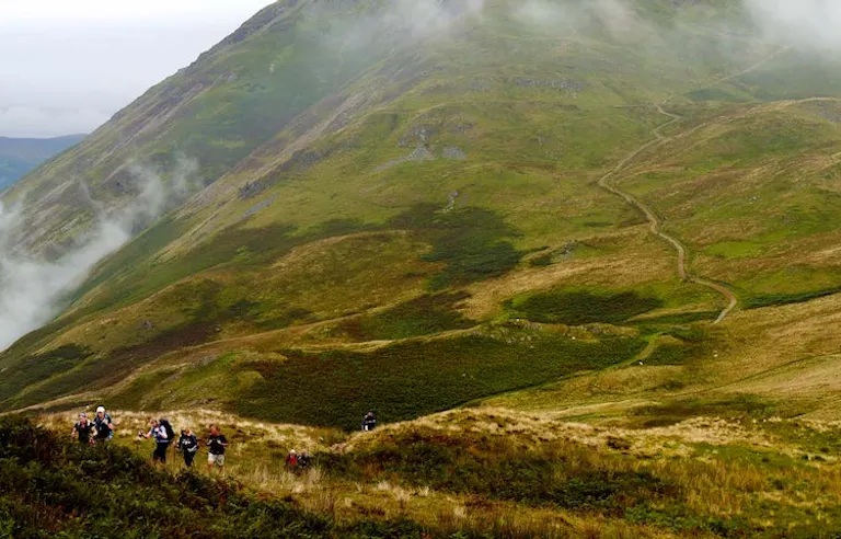 hiking along the mountainous region of the England Coast to Coast trail