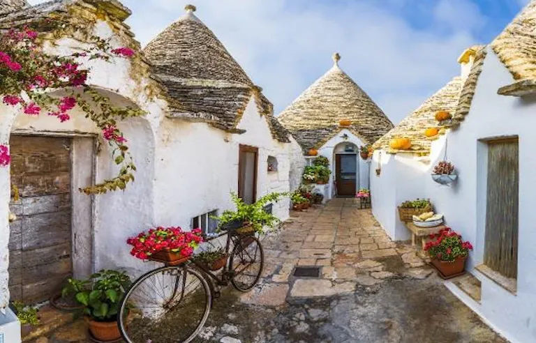 Walk amid Italy's Puglia trulli houses