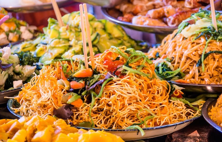 Indulge in a mix of Vietnamese, Chinese, and local specialties
