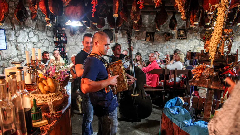 at a bar in Istra and Veneto in a gourmet tour