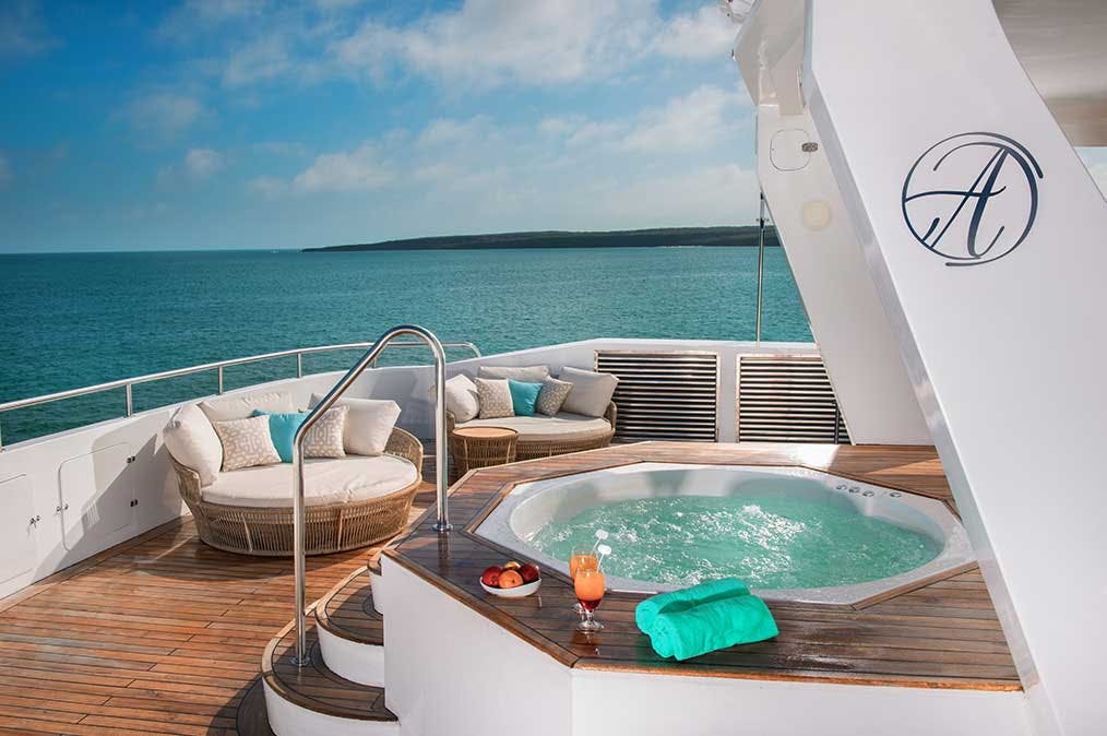 Enjoy the ultimate luxury experience on a Galapagos Luxury Cruise, where you can relax in a jacuzzi on the deck.