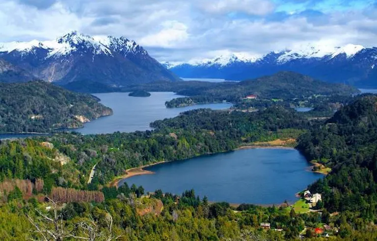 aerial shot of green lush landscapes of Patagonia Lake District