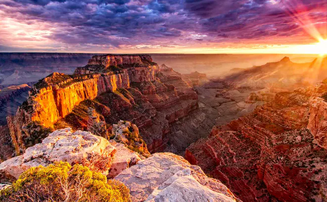 Experience the breathtaking sunrise at the iconic Grand Canyon in Arizona, one of the best hikes in North America.