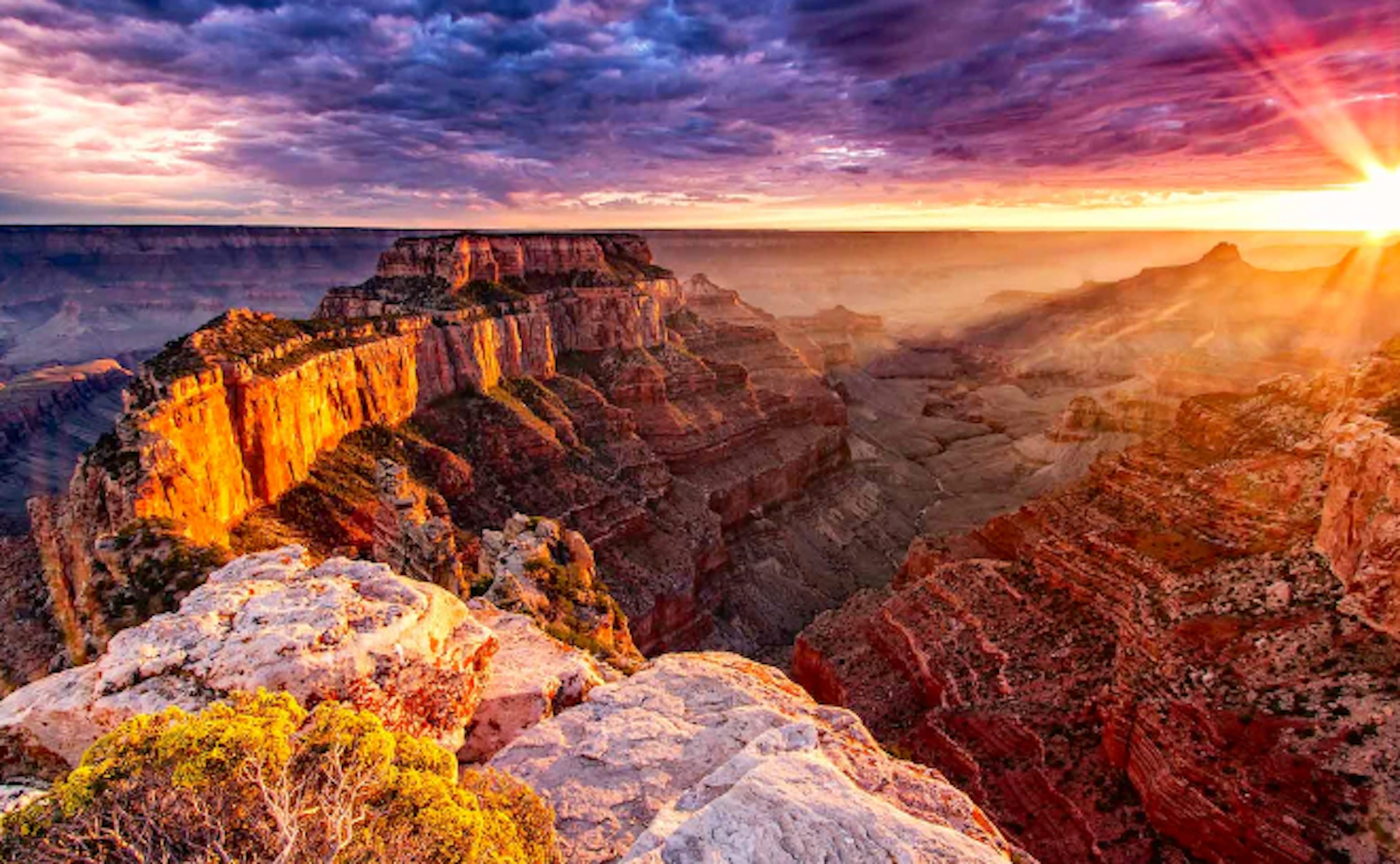 Experience the breathtaking sunrise at the iconic Grand Canyon in Arizona, one of the best hikes in North America.