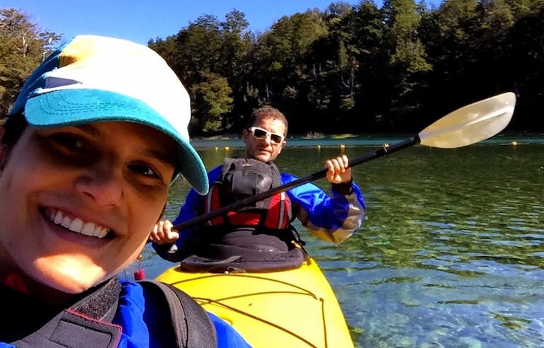 two solo travelers a female and male kayaking in the Patagonia waters