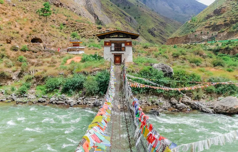 Tourists going on a suspension bridge in Nepal