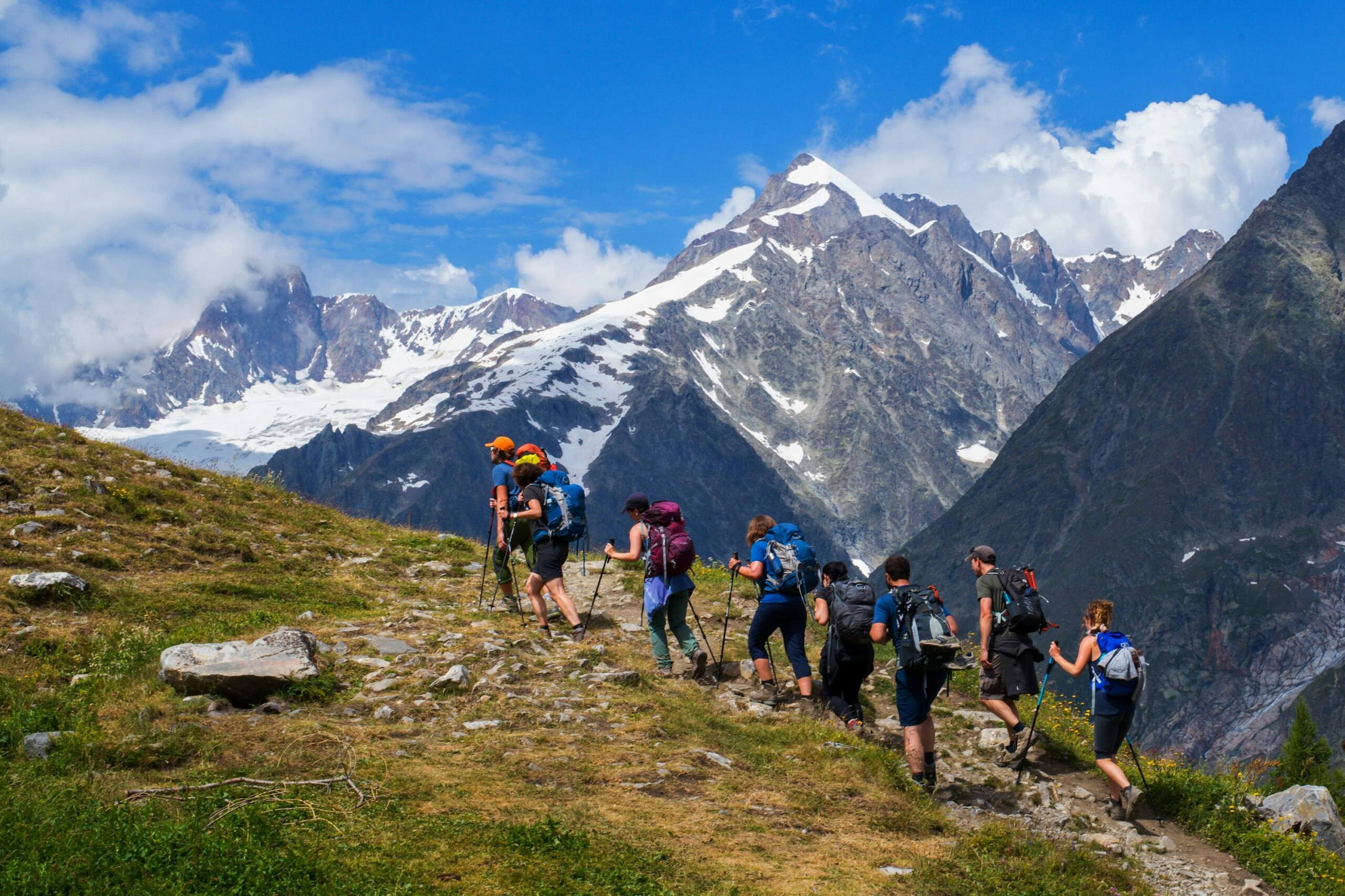 Trail hikers on the Tour du Mont Blanc in the Alps