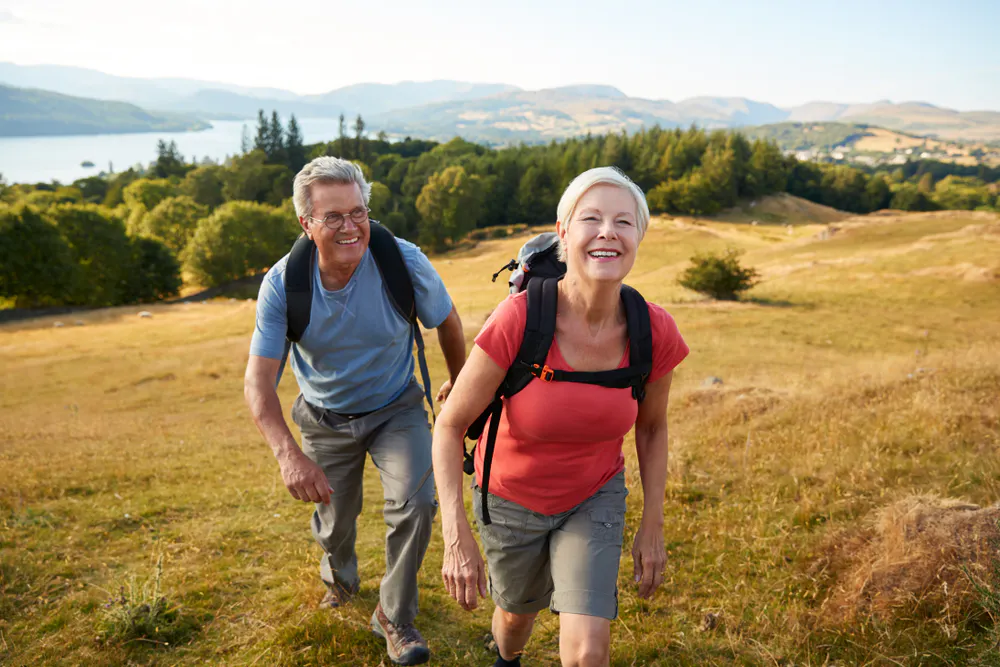 Couple embarking on a hiking trail in the Lake District