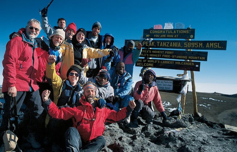 Group of trekkers on a challenging hike in Kilimanjaro in Tanzania