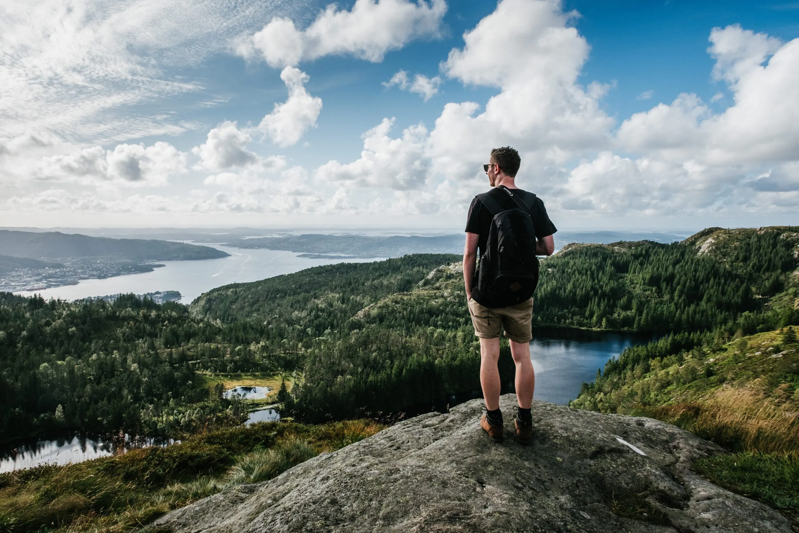 man hiking with an athletic daypack on a multi day hiking trip