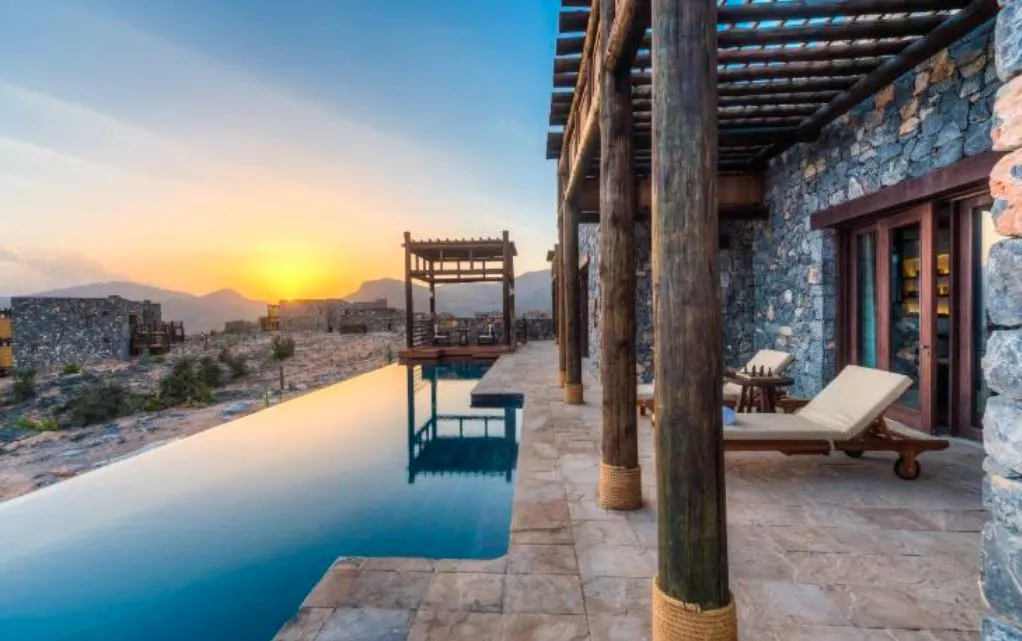 A outdoor pool that belongs to Alila Jabal Akhdor, a unique stay in Oman during a vacation