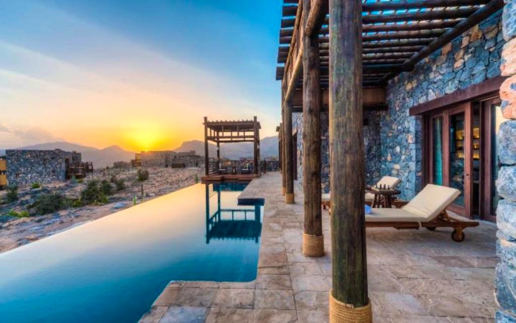 A outdoor pool that belongs to Alila Jabal Akhdor, a unique stay in Oman during a vacation