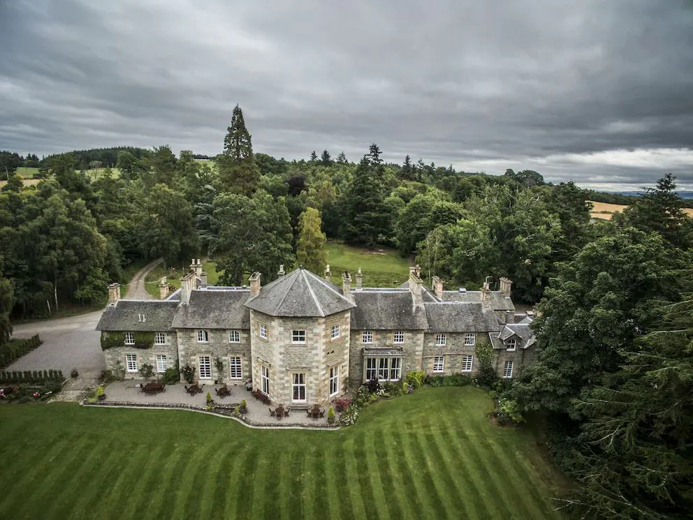 An aerial view of the amazing Coul House in Scotland, that is a perfect overnight stay exploring the Scottish Highlands
