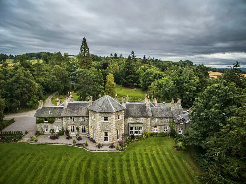 An aerial view of the amazing  Coul House in Scotland, that is a perfect overnight stay exploring the Scottish Highlands
