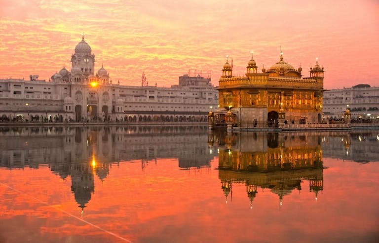 stunning Sikh Golden Temple during sunset in India, Asia