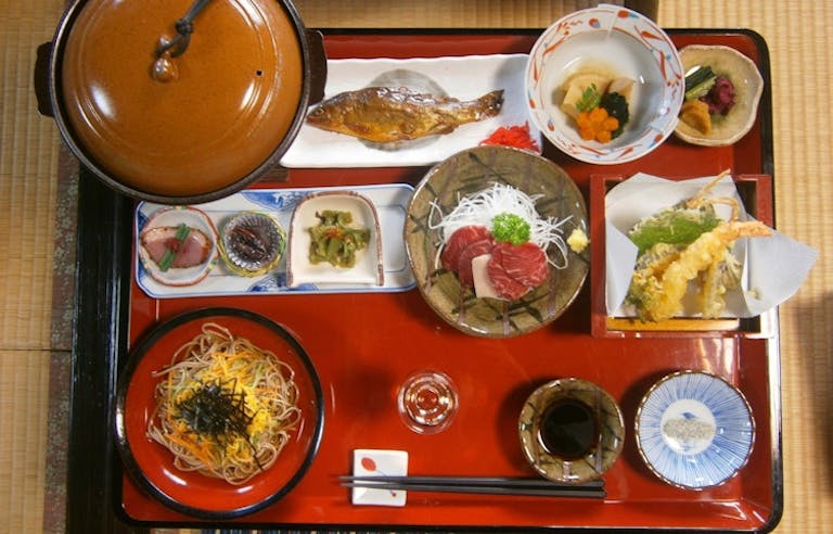 Japanese side dishes offered in traditional restaurant in Tokyo, Japan