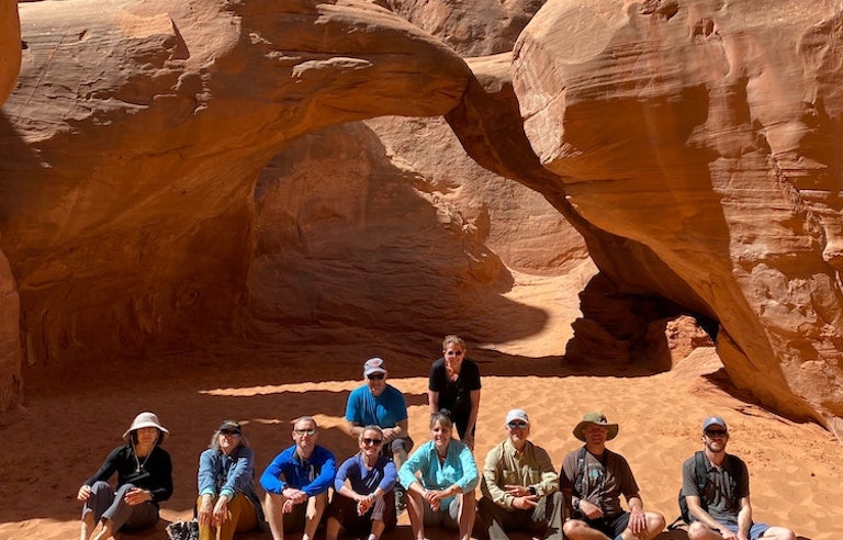 Large group in a guided tour through Arches, Canyonlands. Capitol Reef, Bryce and Zion