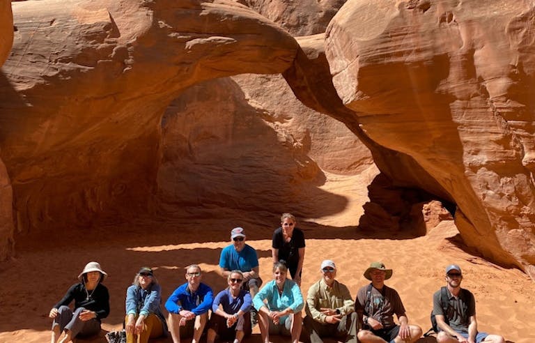 group of travelers on a guided hike in Utah's National Parks 
